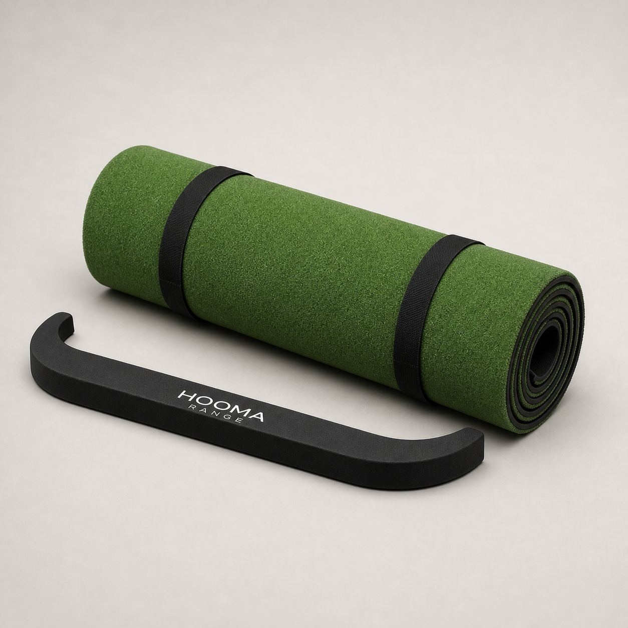 HOOMA RANGE putting mat rolled for storage